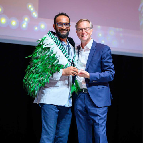 Tariq Receiving award at Best of Belron 2024